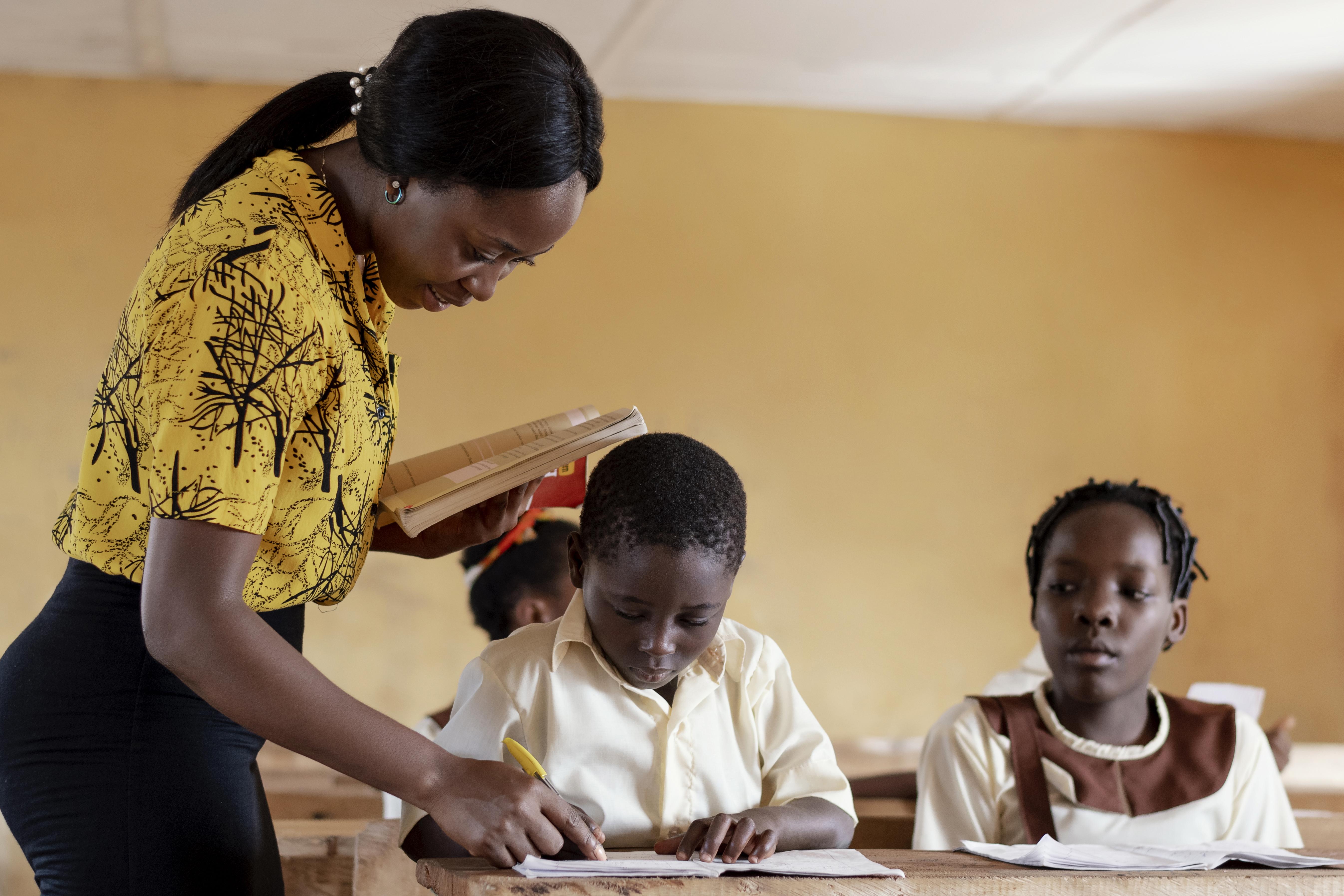 Group of African kids paying attention in class