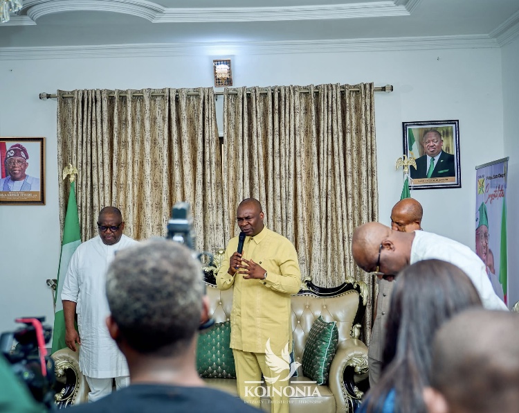Apostle Joshua prays at the Plateau Government house