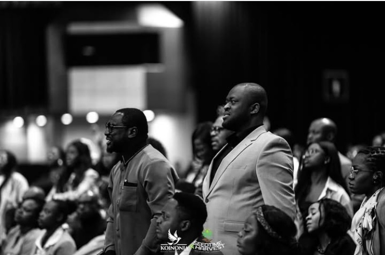 People stood listening to the Word