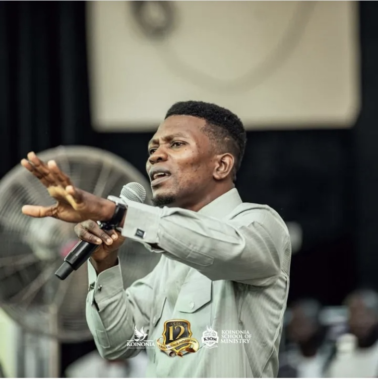Koinonia leader on stage
